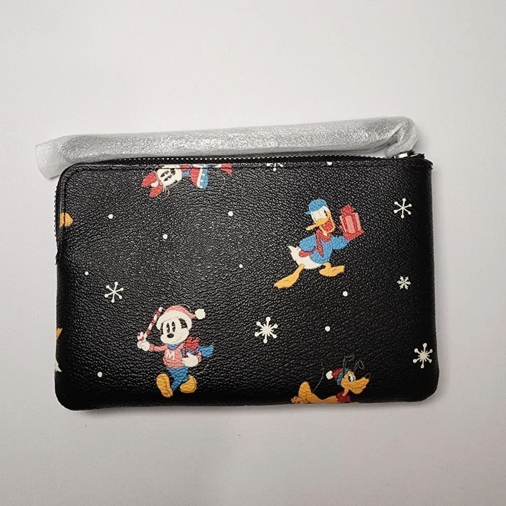 NWT Coach CN031 Disney Corner Zip Wristlet Holiday Minnie Mickey Daffy Pluto